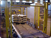 End of line packaging machines present significant hazards. They operate automatically and have openings large enough to allow the passage of pallet loads and therefore provide potential for unauthorised access.
