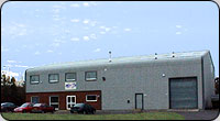 The factory and offices are sited on a 1.4 acre freehold site. The purpose built factory was completed in 1989 and provides 12000 square feet of floor space, 6000 square feet of which is dedicated to manufacturing.